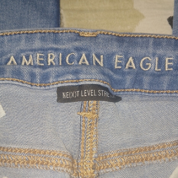 American Eagle Outfitters Skinny Blue Jeans with Distressed Detailing - Picture 2 of 4